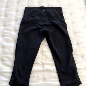Women’s Lululemon Base Pace High-Rise Crop 17". Black, size 8. Hardly worn.